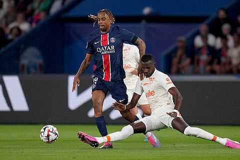 League 1, Paris Saint-Germain vs Montpellier: Montpellier's Boubakar Kouyate tries to tackle PSG's Bradley Barcola